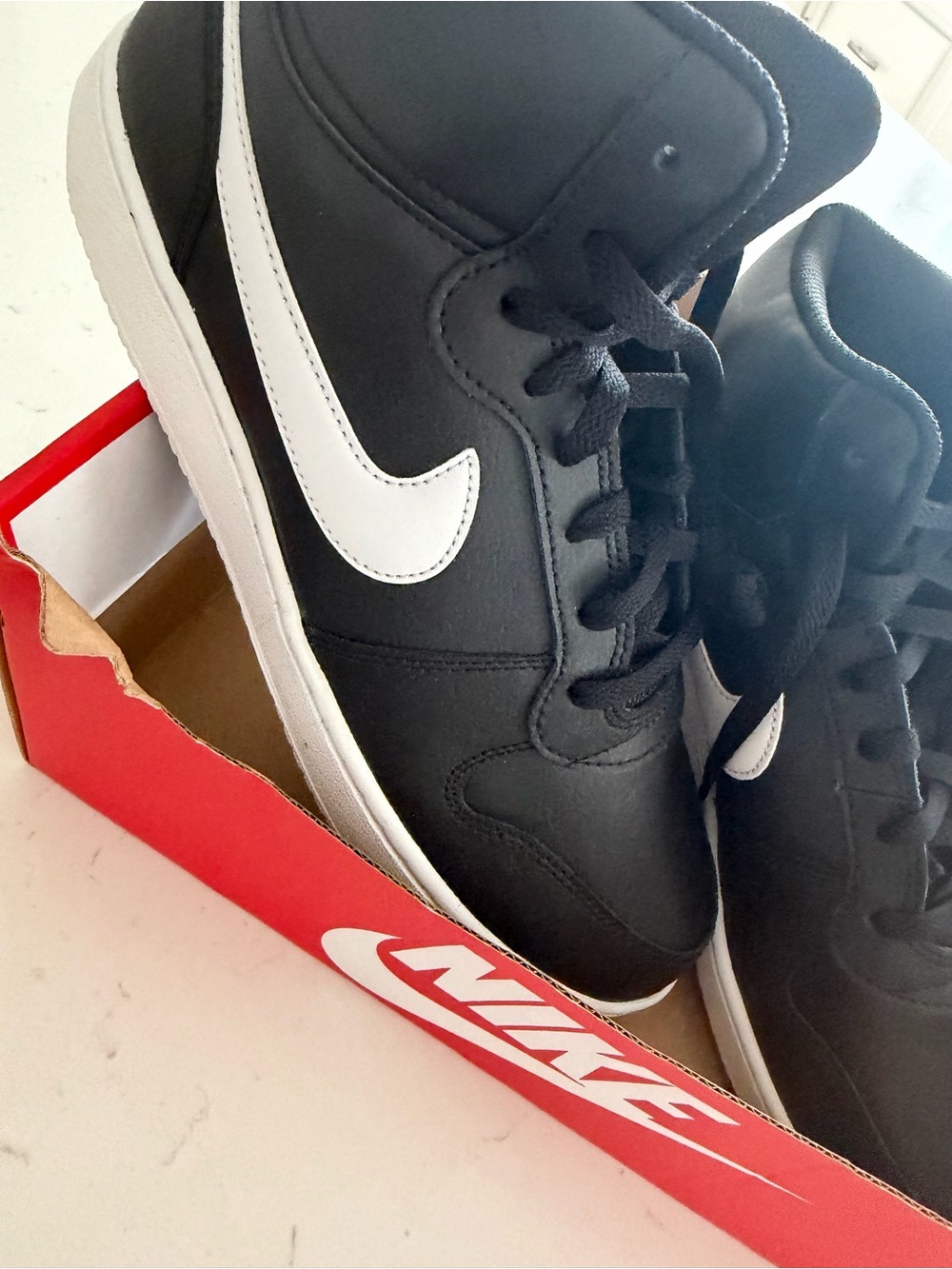 Nike Black and White Mid-Top Sneakers